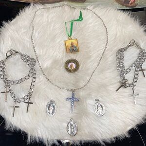 Religious jewelry-necklace, pendants, decorative bracelets(?), coin, etc